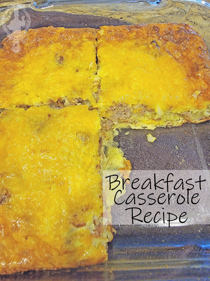 Baking dish with a serving of breakfast casserole missing.