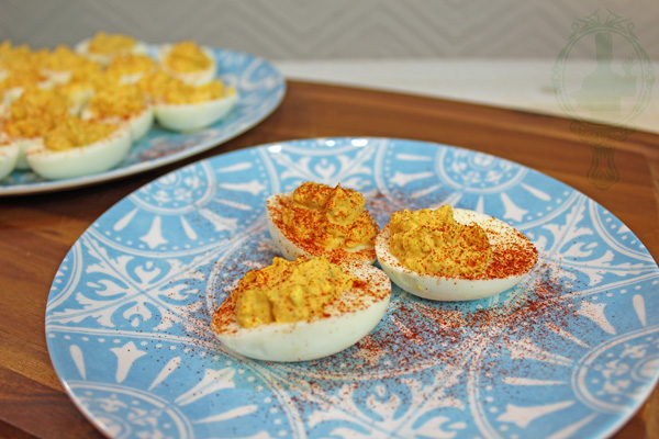 3 deviled eggs on a plate