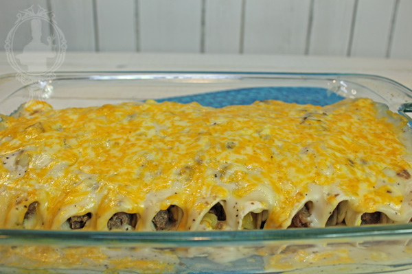 Breakfast Enchiladas with Country Gravy in the baking dish fresh out of the oven.