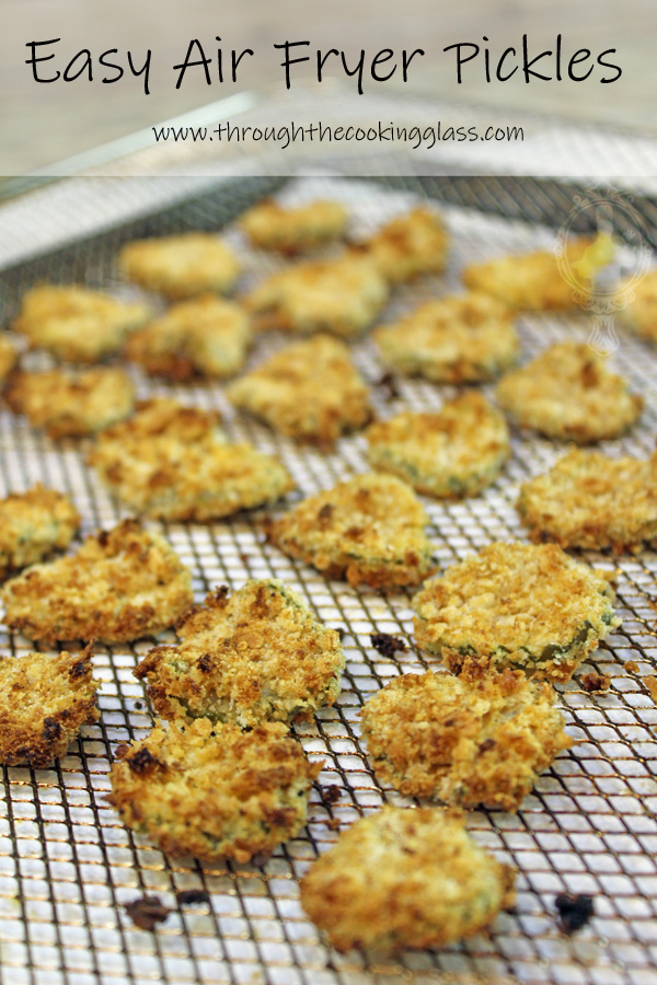 Easy Air Fryer Fried Pickles just out of the air fryer on the baking basket.