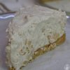 Close up of a slice of Apple Cheesecake on a plate.