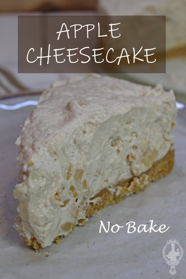 One slice of Apple Cheesecake on a plate with the Apple Cheesecake in the back.