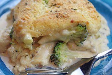 Close up image of a serving of Chicken Alfredo Crescent Bake on a plate ready to eat.