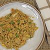 Overhead view of a plate with chicken fried rice.