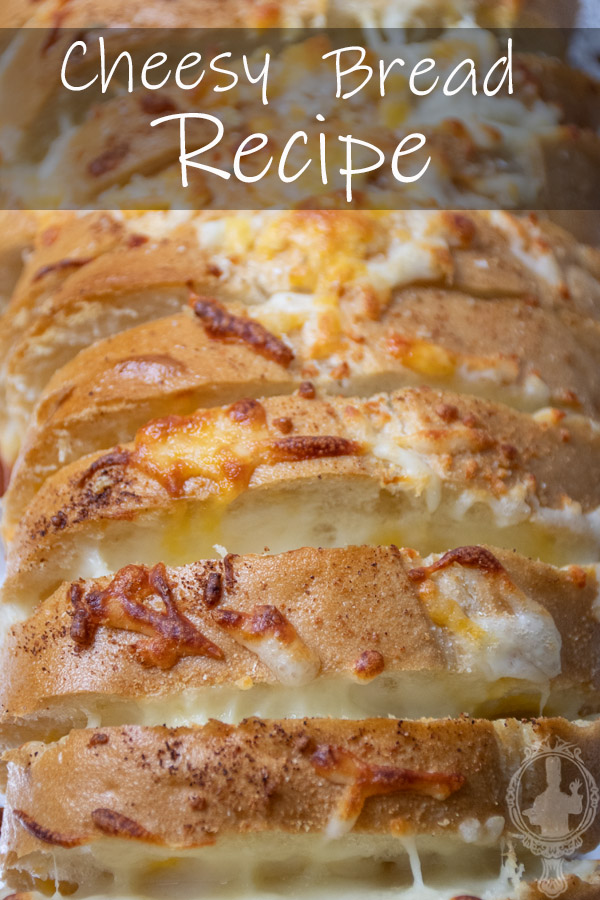Close up angled view of a loaf of cheesy bread.