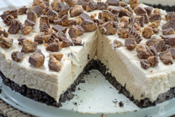 Peanut Butter Cheesecake with a slice missing.