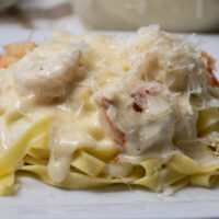 Close up of a serving of Pasta with Alfredo Sauce.