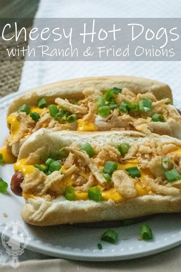 Angled shot of 2 cheesy ranch dogs